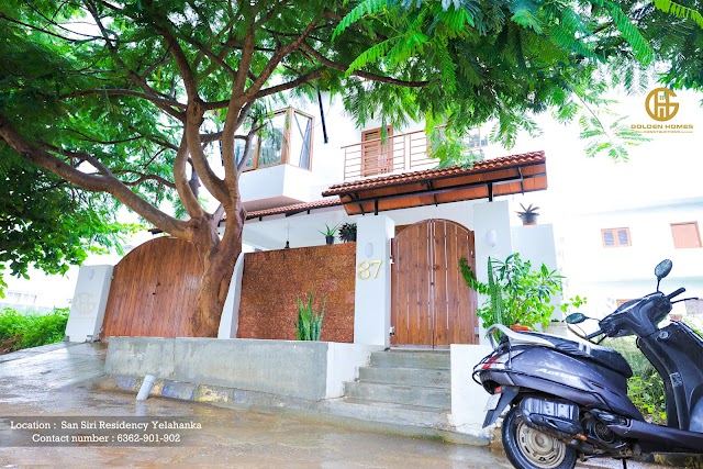 Entrance with tree-lined frontage, Mr Arun M's home, San Siri Residency, Yelahanka