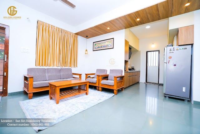 Living room with wooden ceiling detail, Mr Arun M's home, San Siri Residency, Yelahanka